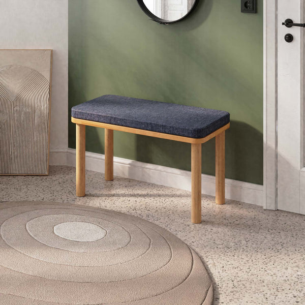 Dorrin Bench 80 x 38 cm, lacivert keten döşeme, masif kayın gövde, ev ortamında kullanım görünümü