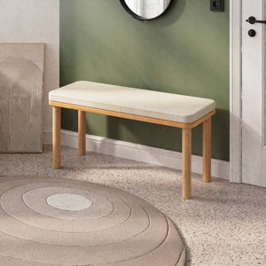Dorrin Bench 100 x 38 cm, ekru keten döşeme, masif kayın gövde, ev ortamında kullanım görünümü