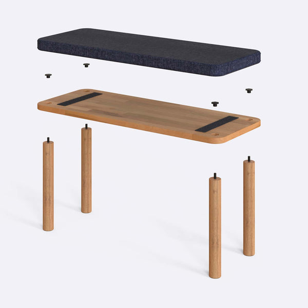 Dorrin Bench 100 x 38 cm parçalarına ayrılmış montaj görünümü, lacivert keten oturum ve masif kayın ayaklar