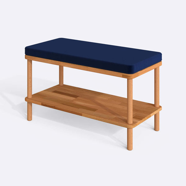 Waljan Bench 80 x 38 cm, lacivert kadife döşeme, masif kayın gövde, beyaz zeminde üç çeyrek açıdan stüdyo çekimi