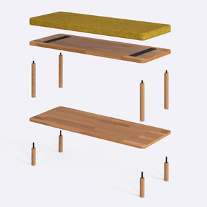 Waljan Bench 100 x 38 parçalarına ayrılmış montaj görünümü, sarı keten oturum ve masif kayın ayaklar ile bağlantı vidaları
