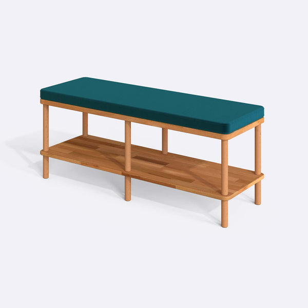 Waljan Bench 120 x 38, petrol kadife döşemeli oturum ve masif kayın gövde, beyaz zeminde üç çeyrek açıdan stüdyo çekimi