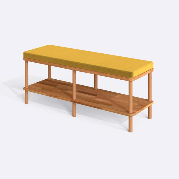 Waljan Bench 120 x 38, sarı kadife döşemeli oturum ve masif kayın gövde, beyaz zeminde üç çeyrek açıdan stüdyo çekimi