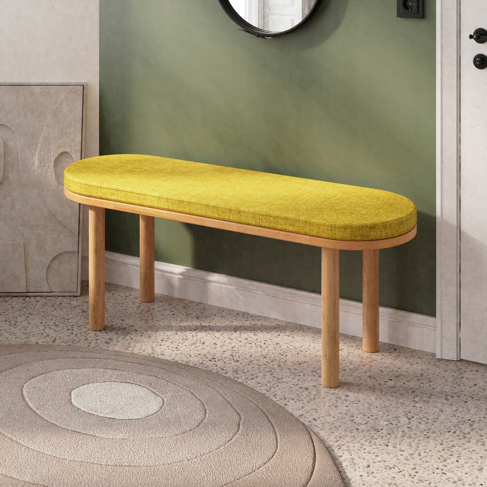 Shiv Bench, masif kayın gövde ve kumaş döşeme, 120 cm genişliğinde, ev ortamında kullanım görünümü