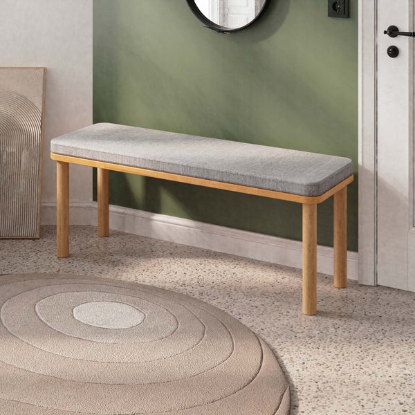 Dorrin Bench 120 x 38, gri keten döşeme, masif kayın gövde, döşenmiş oda ortamında kullanım görünümü