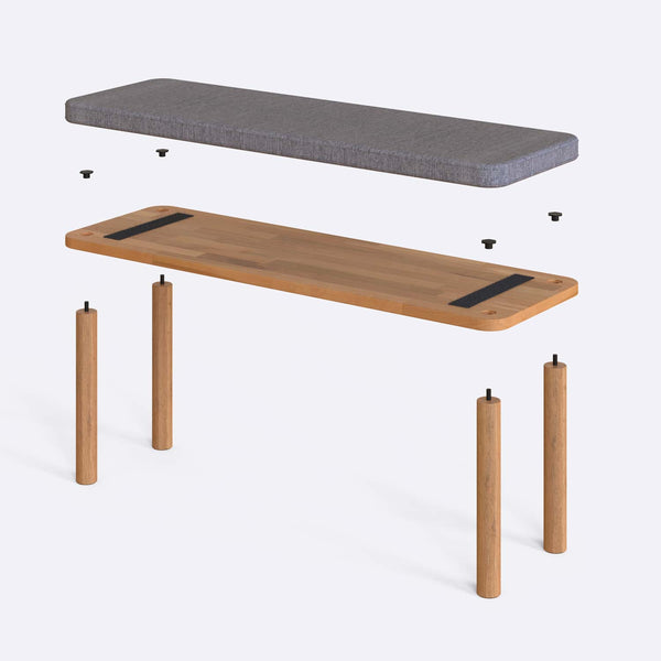 Dorrin Bench 120 x 38 parçalarına ayrılmış montaj görünümü, gri keten oturum ve masif kayın ayaklar ile bağlantı vidaları