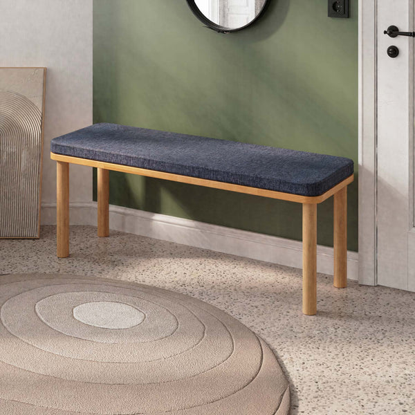 Dorrin Bench 120 x 38, lacivert keten döşeme, masif kayın gövde, döşenmiş oda ortamında kullanım görünümü