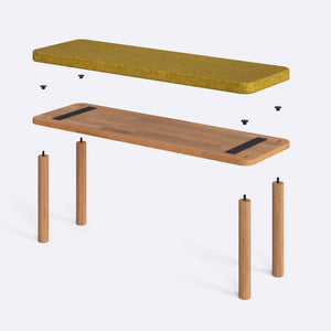 Dorrin Bench 120 x 38 parçalarına ayrılmış montaj görünümü, sarı keten oturum ve masif kayın ayaklar ile bağlantı vidaları