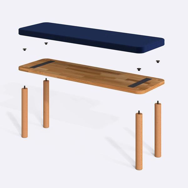 Dorrin Bench 120 x 38 parçalarına ayrılmış montaj görünümü, lacivert kadife oturum ve masif kayın ayaklar