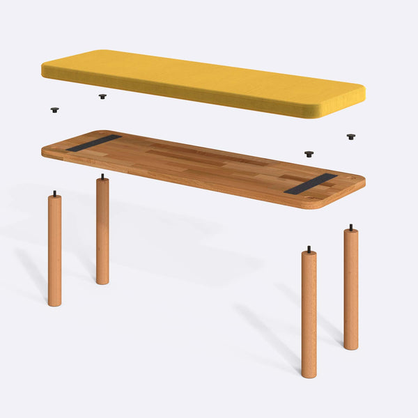 Dorrin Bench 120 x 38 parçalarına ayrılmış montaj görünümü, sarı kadife oturum ve masif kayın ayaklar ile bağlantı vidaları