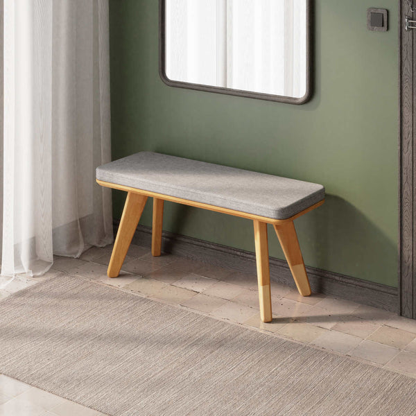 Han Bench 100 x 38 cm, gri keten döşeme, masif kayın gövde, ev ortamında kullanım görünümü