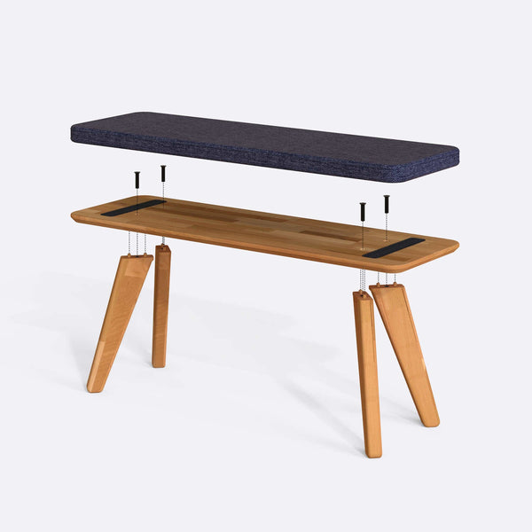Han Bench 120 x 38 parçalarına ayrılmış montaj görünümü, lacivert keten oturum ve masif kayın ayaklar