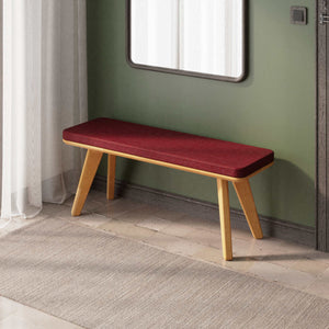 Han Bench 120 x 38, bordo keten döşeme, masif kayın gövde, ev ortamında kullanım görünümü