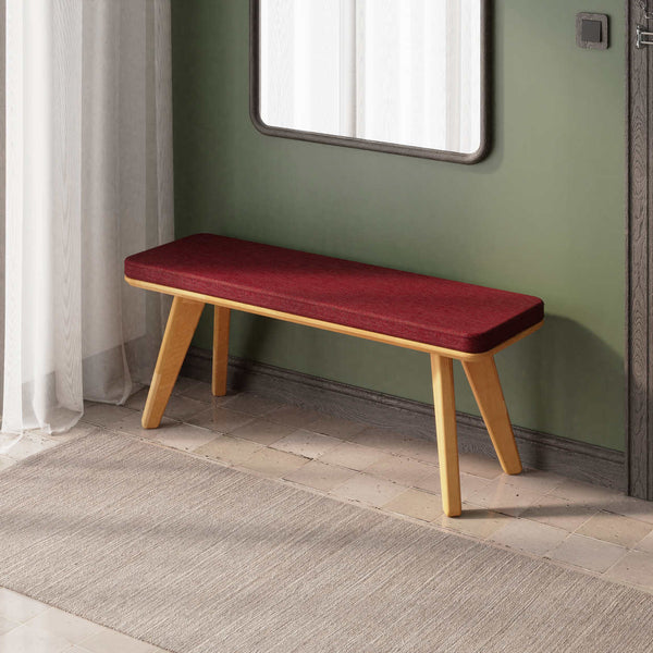 Han Bench 120 x 38, bordo keten döşeme, masif kayın gövde, ev ortamında kullanım görünümü