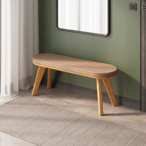 Yase Bench 120 x 38, kahve keten döşemeli oturum ve masif kayın gövde, döşenmiş oda ortamında kullanım görünümü