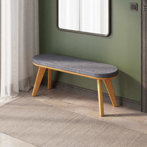 Yase Bench 120 x 38, kül keten döşemeli oturum ve masif kayın gövde, döşenmiş oda ortamında kullanım görünümü