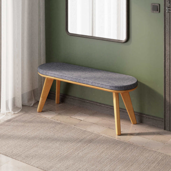 Yase Bench 120 x 38, kül keten döşemeli oturum ve masif kayın gövde, döşenmiş oda ortamında kullanım görünümü