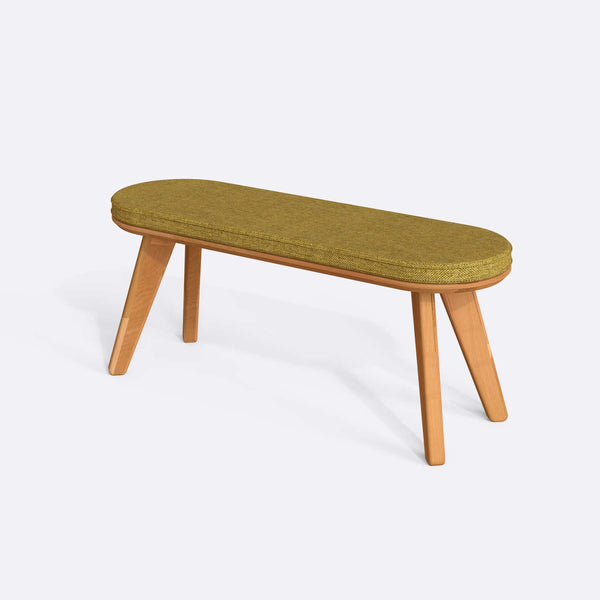 Yase Bench 120 x 38, sarı keten döşemeli oturum ve masif kayın gövde, beyaz zeminde üç çeyrek açıdan stüdyo çekimi