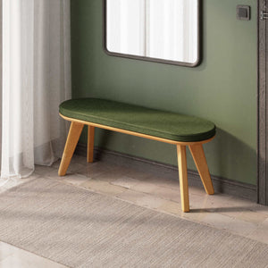 Yase Bench 120 x 38, yeşil keten döşemeli oturum ve masif kayın gövde, döşenmiş oda ortamında kullanım görünümü
