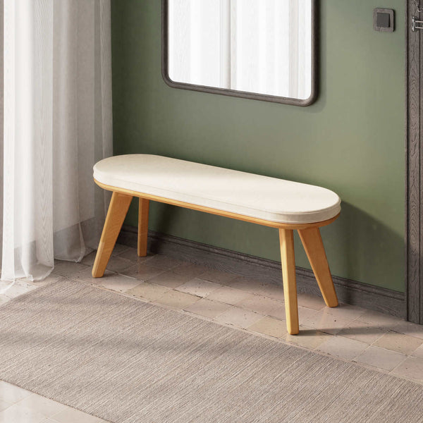 Yase Bench 120 x 38, ekru kadife döşemeli oturum ve masif kayın gövde, döşenmiş oda ortamında kullanım görünümü