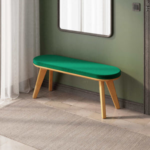 Yase Bench 120 x 38, zümrüt kadife döşemeli oturum ve masif kayın gövde, döşenmiş oda ortamında kullanım görünümü